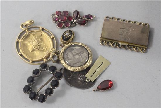 A French gold pendant, a Georgian foiled garnet pendant and other small items.